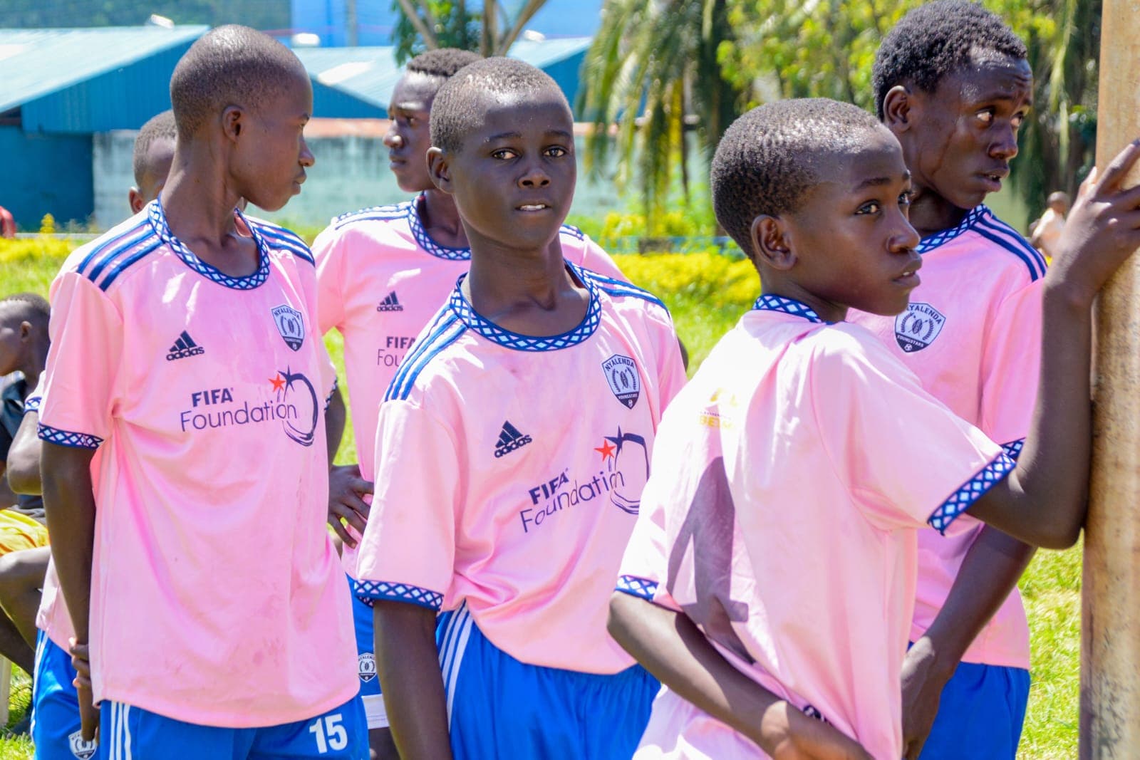 Young players standing together on the pitch